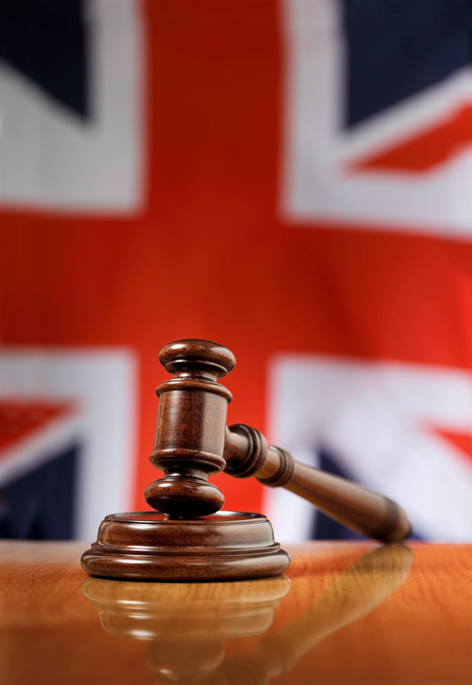 Legal map of the United Kingdom with gavel symbolising notary services